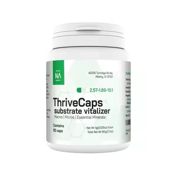 White NA Thrive Caps root tab container with a green label.