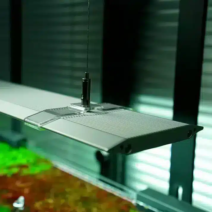 Chihiros A2 Max LED light hanging above planted aquarium using steel cable suspension kit