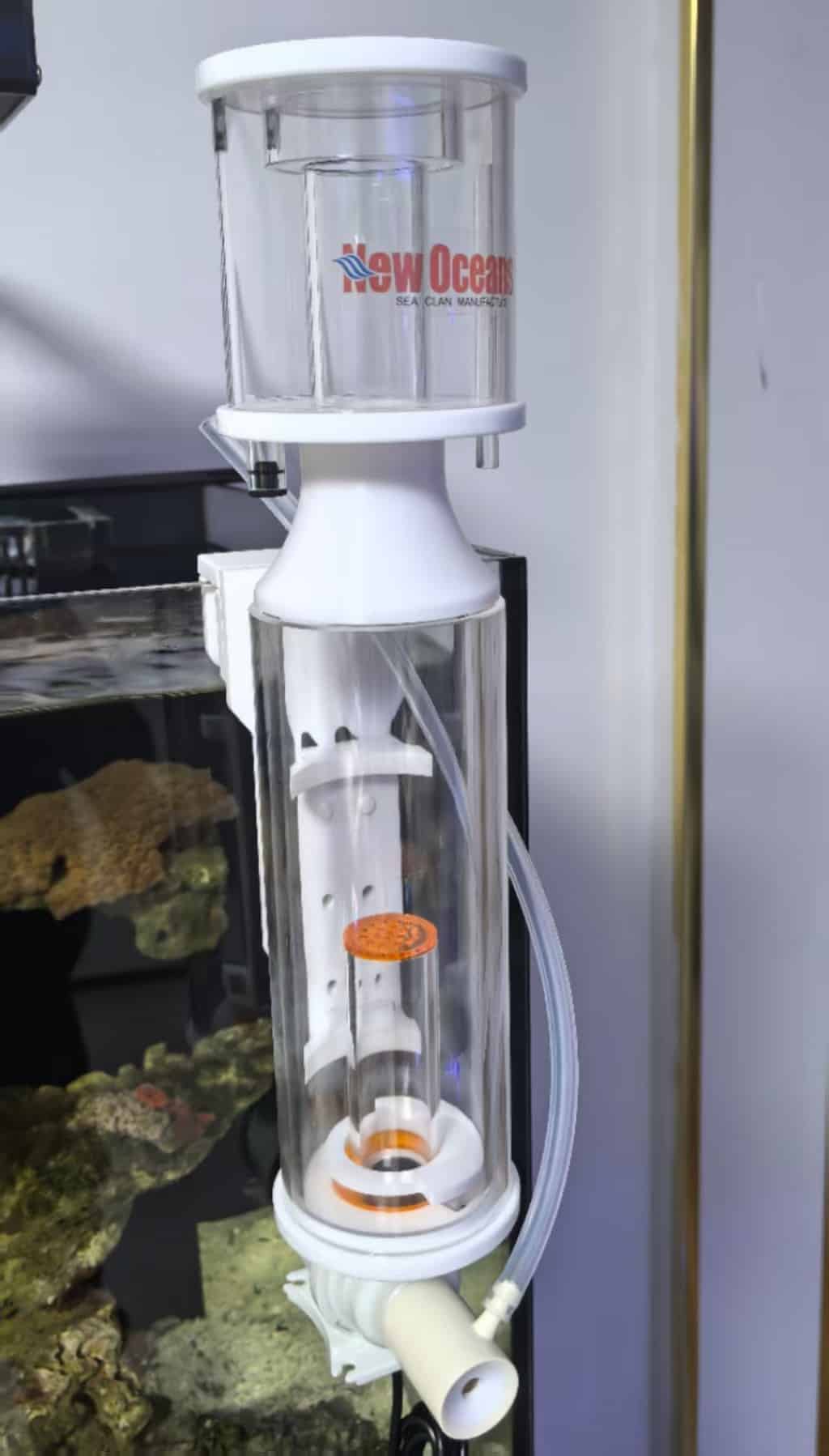 Close-up view of Zoobam DQ-Series DC protein skimmer installed on aquarium wall