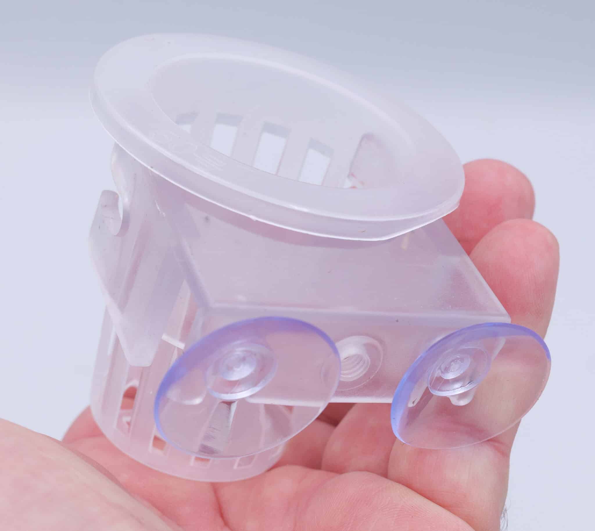 Clear hanging aquarium plant pot configured for rimmed tank with suction cup mount